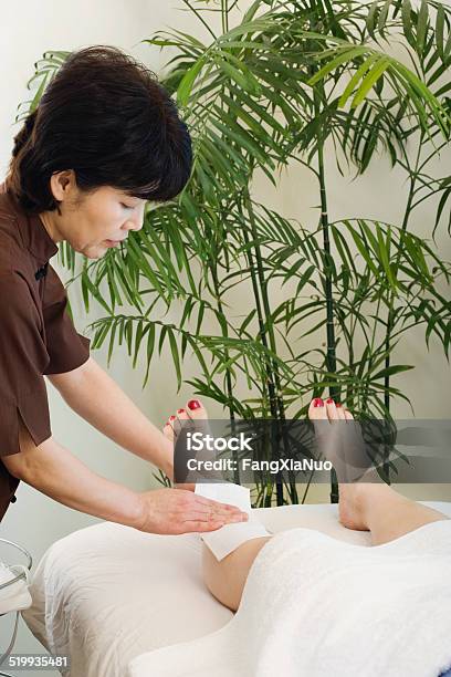 Mature Woman Having Legs Waxed Stock Photo - Download Image Now - 40-44 Years, 45-49 Years, Adult