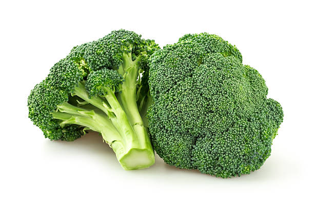 Broccoli Picture of fresh cut broccoli. Broccoli is brightly illuminated and photographed against white background. broccoli photos stock pictures, royalty-free photos & images