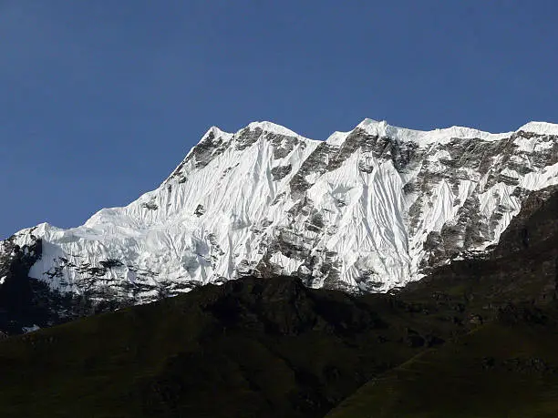 The snowy peak of the Annapurna IV Himalayan giant on a clear day in Nepal.