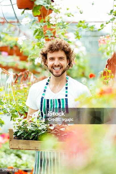 Florist With Flowers Stock Photo - Download Image Now - 20-29 Years, Activity, Adult