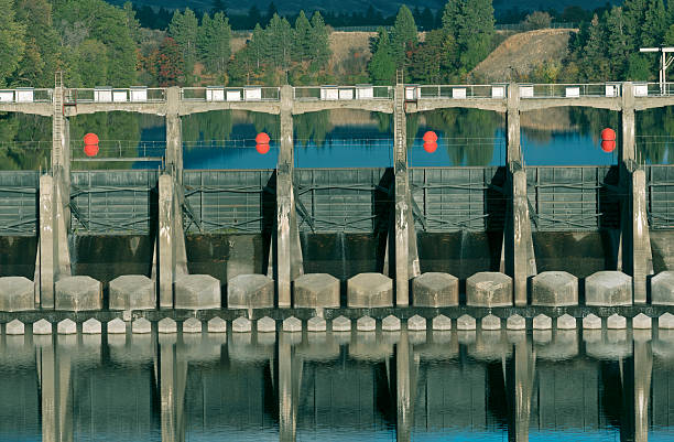 Upriver Dam on river in Spokane WA Upriver Dam on Spokane River in rural Spokane WA at sunset in October spokane river stock pictures, royalty-free photos & images