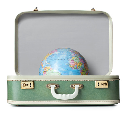 Suitcase with globe. Image made ​​using two photos at native resolution.