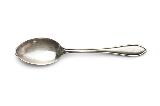 old silver spoon isolated on white with clipping path