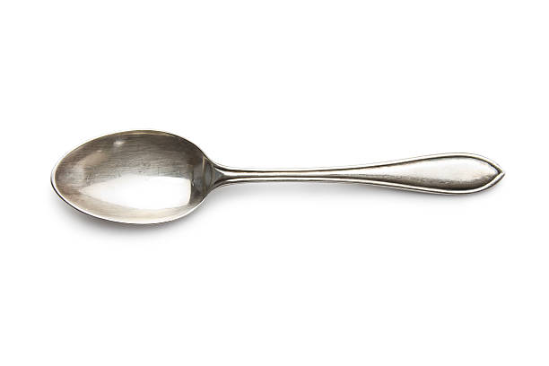 old silver spoon stock photo