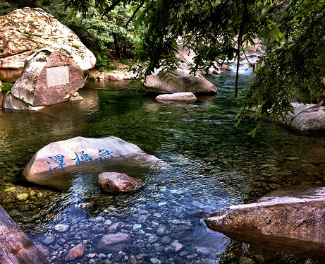 Hiking on the scenic trail up Laoshan Mountain you will come across many rock pools.  Each pool has a Taoist teaching carved into the rock for one to contemplate on during the hike.