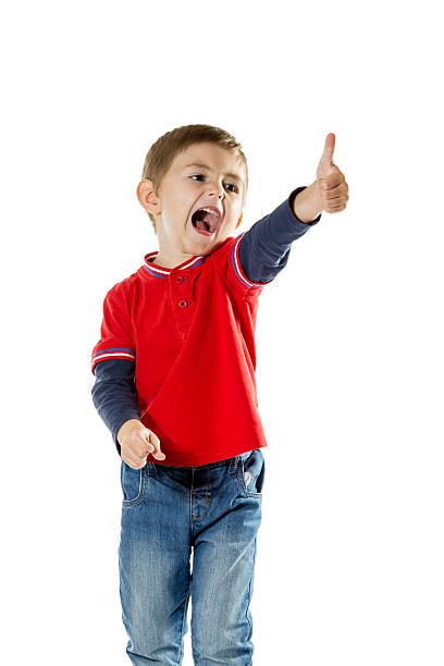 istock Portrait of a standing boy with thumb up 519940007