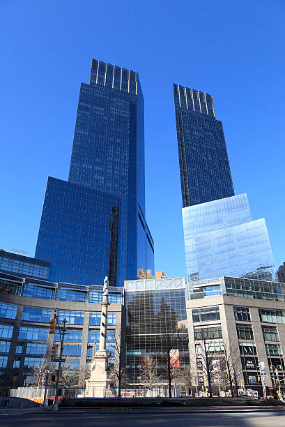 Time Warner Center New York, NY, USA - February 18, 2013: The Time Warner Center: Architecture view of Columbus Circle in New York. Columbus Circle with famous Time Warner Center skyscrapers completed in 2003 is one of New York landmarks. time warner center columbus circle pictures stock pictures, royalty-free photos & images