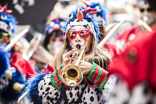 Konstanz, Germany - February 19, 2009: A man with trombone plays his brass instrument on a carnival event.