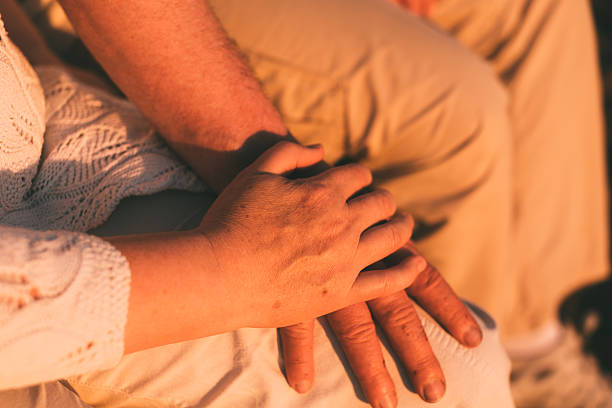 istock Senior couple hands together photo 519960124