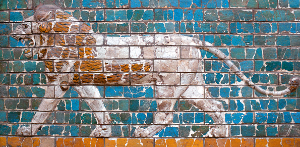 Istanbul, Turkey - October 30, 2015: Glazed brick panel with Lion - details of the Babylonian Ischtar Tor (Ishtar Gate) in the Istanbul Archaeology Museum.