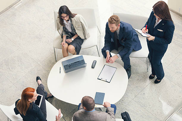 istock Group of business people talking shot from above 519965810