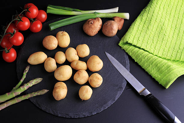 istock New potatoes, green onion, radishes. 519967182