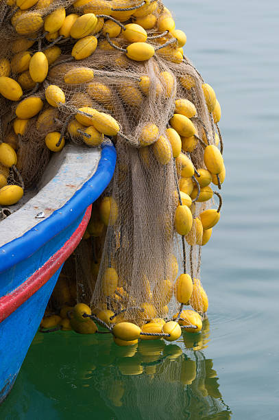 ボートや商業漁網 - commercial fishing net netting fishing striped ストックフォトと画像