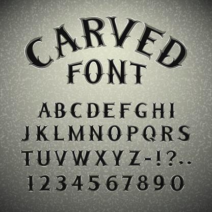 Font Carved in Stone. In the EPS file, each element is grouped separately. Clipping paths included in additional jpg format.