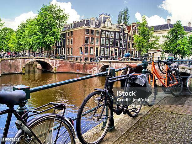 Amsterdam Canal And Bicycles Stock Photo - Download Image Now - Amsterdam, Bicycle, Building Exterior
