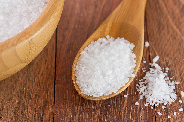 istock salt in bowl with spoon on the table 519976045