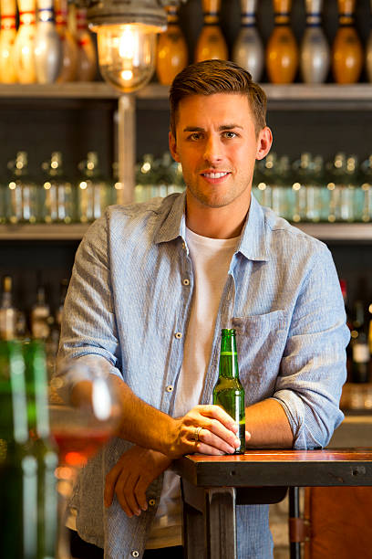 istock Young Man at the Bar 519976719