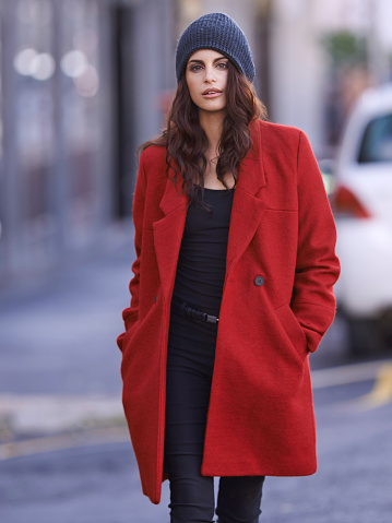 Portrait of a beautiful young woman out and about in the city