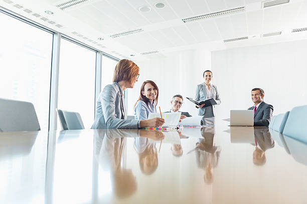istock Businesspeople in conference room 519977259