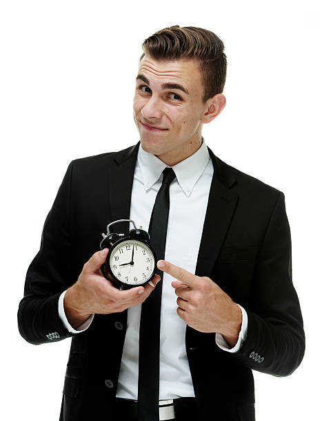 istock Annoyed businessman showing time 519977453