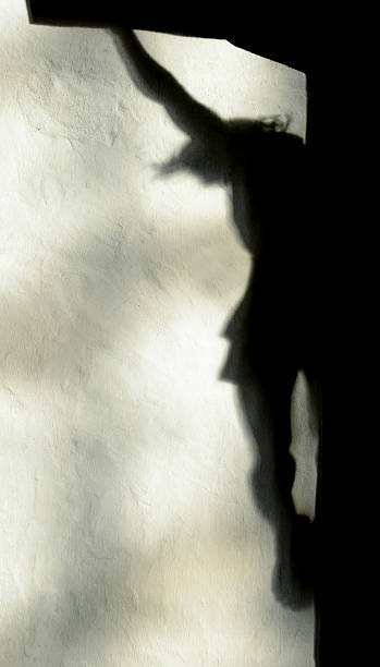 istock Shadow of Jesus Christ on the Cross 519978333