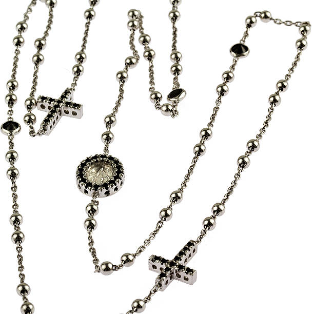 istock Silver Rosery Beads with Cross and medallion 519978359