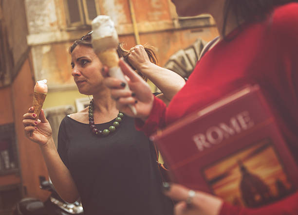 istock Tourists with a guide eating icecream in Rome 519997833
