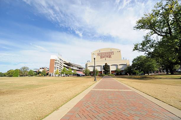 Mississippi State University Football Stadium Mississippi State University, Mississippi, USA - October 18, 2014: View of Mississippi State University football stadium from promenade walkway leading from the junction area near Dorman Hall on campus. mississippi state university stock pictures, royalty-free photos & images