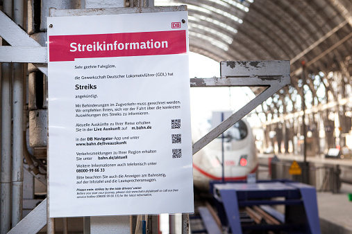Frankfurt, Germany - October 18, 2014: Passengers information board referring to train drivers strike at railway station Frankfurt. German rail travellers on Saturday faced delays and disruptions as train drivers' union GDL began a large strike in German railway.