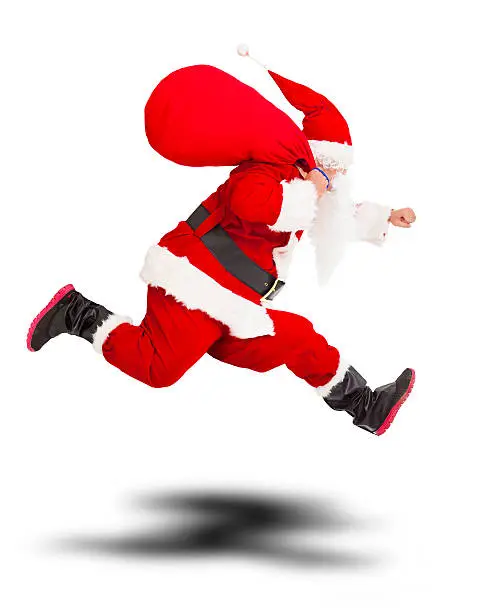merry Christmas Santa Claus holding gift bag and running.isolated on white background
