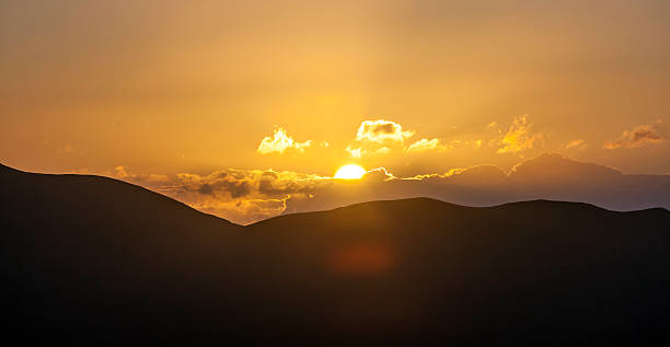 istock sunrise over the volcanic mountains 520002235