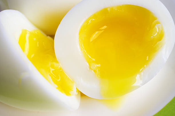 яйцо всмятку - hard cooked egg стоковые фото и изображения