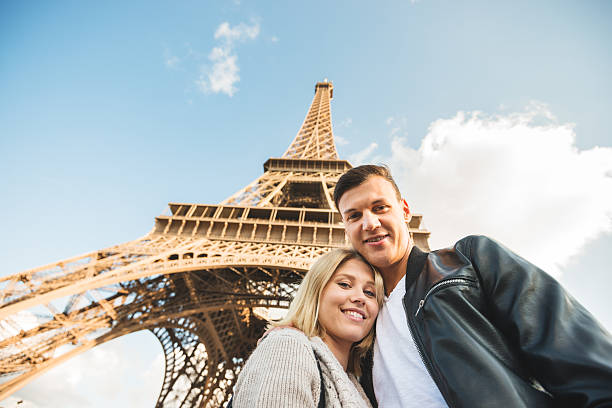 istock romantic couple enjoying the sunset on Paris 520003071