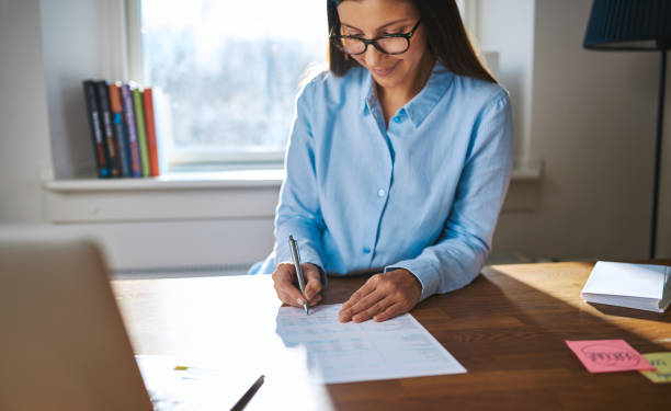 istock Successful female entrepreneur working at her desk 520004574