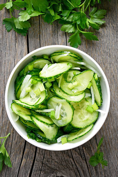 istock Cucumber salad, top view 520004860