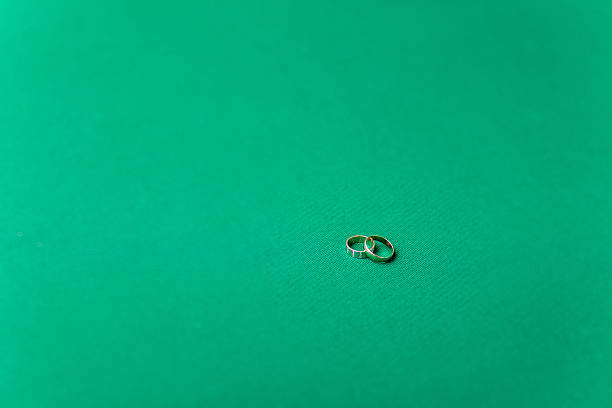 istock Wedding rings on the billiard table 520005650