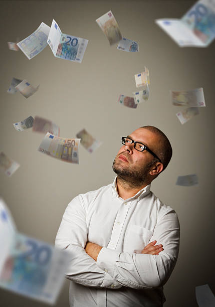 istock Man in white and Euro 520007586