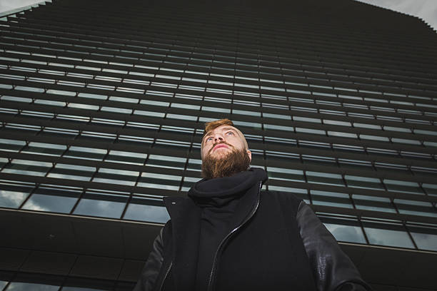 istock Stylish bearded man posing in the street 520007852