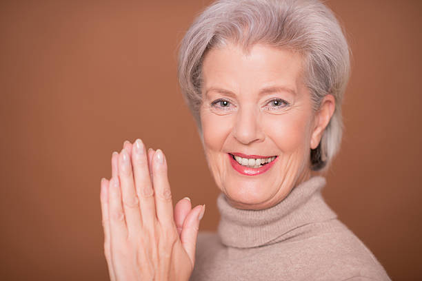 istock Happy senior woman 520008256