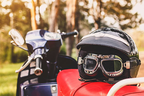 istock Old scooter with retro helmet on seat 520008512