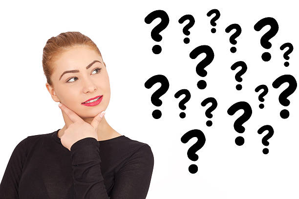 istock Thinking smiling woman with questions mark 520008742