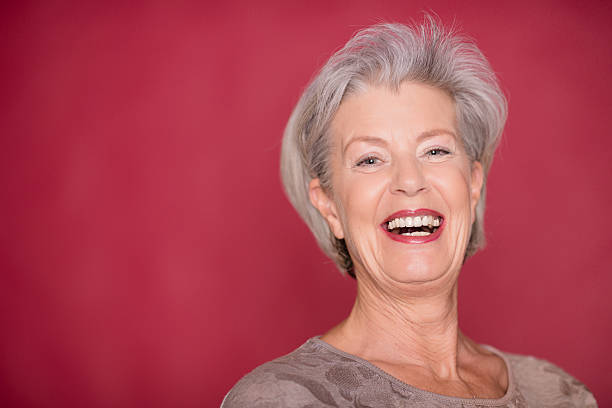 istock Smiling senior woman 520009378