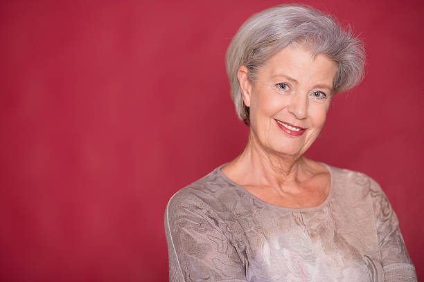 istock Smiling senior woman 520009496