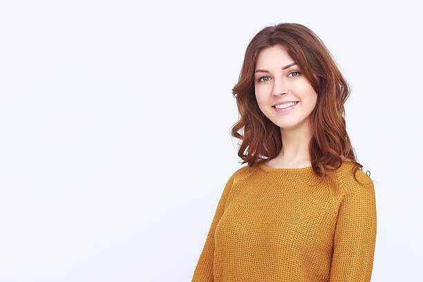 istock Pretty girl in orange sweater 520012122