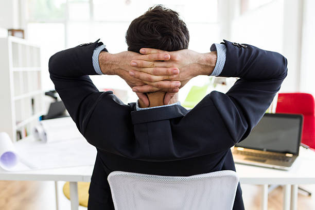 istock Handsome young businessman relaxing one moment in the office. 520013882