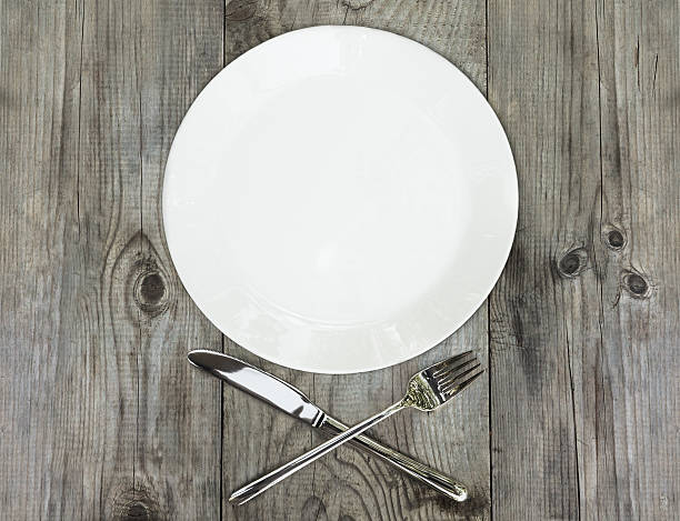 istock Kitchen utensils with silver cutlery on rustic wooden background 520014344