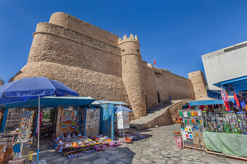 Fortified castle with street shops in medina of Hammamet, Tunisia
