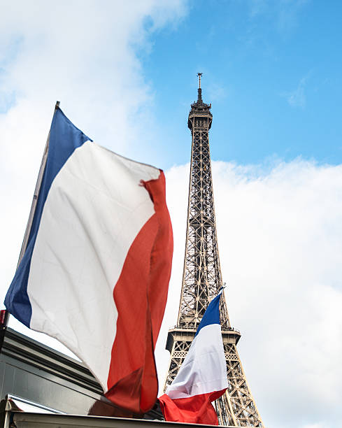 istock Tour eiffel tower with france flag waving 520018373