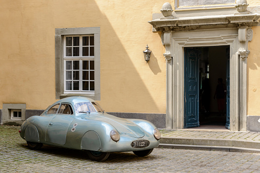 Jüchen, Germany - August 1, 2014: 1939 Porsche 64 Prototype car. The Porsche 64 is considered as the first Porsche car and the predecessor of the later 365 production car. The car is on display during the 2014 Classic Days event at Schloss Dyck.