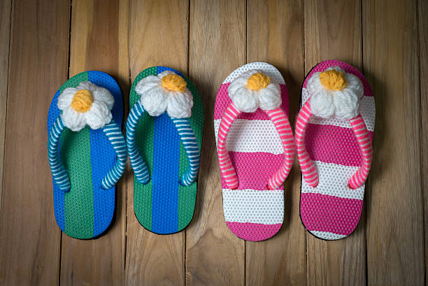 istock colorfull sandal with flower on wooden background 520020967